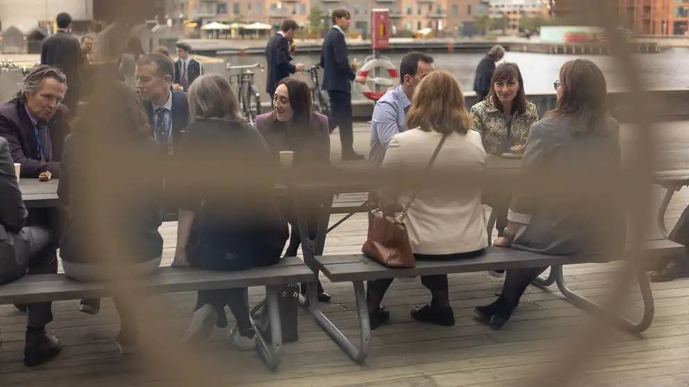 Coffee break outside - people networking.