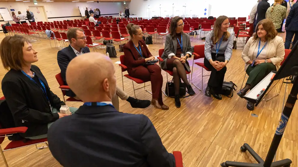 Group work session. People sitting in a cirkle.