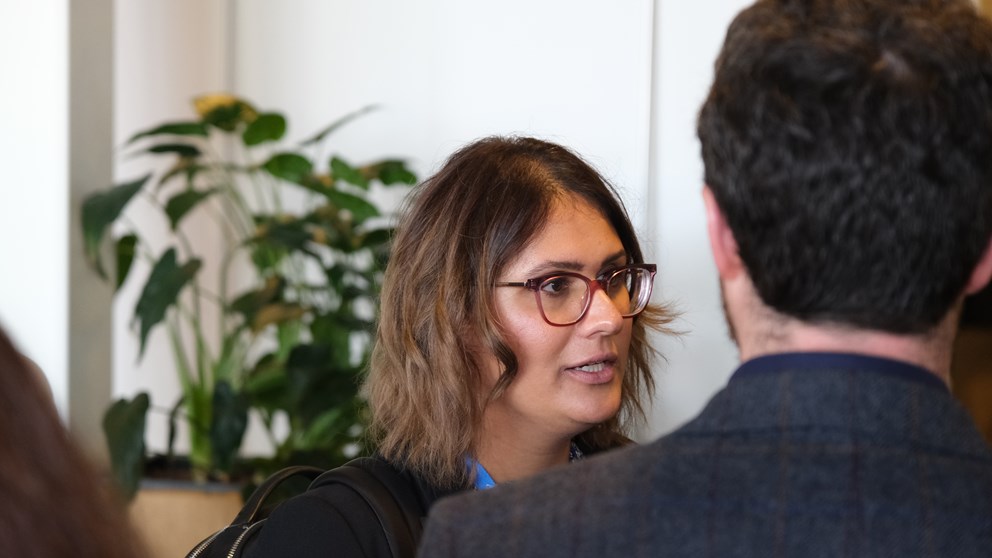 Woman networking with man